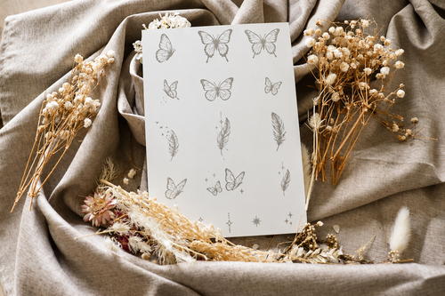 Tatouage temporaire papillons et plumes SKNLY 